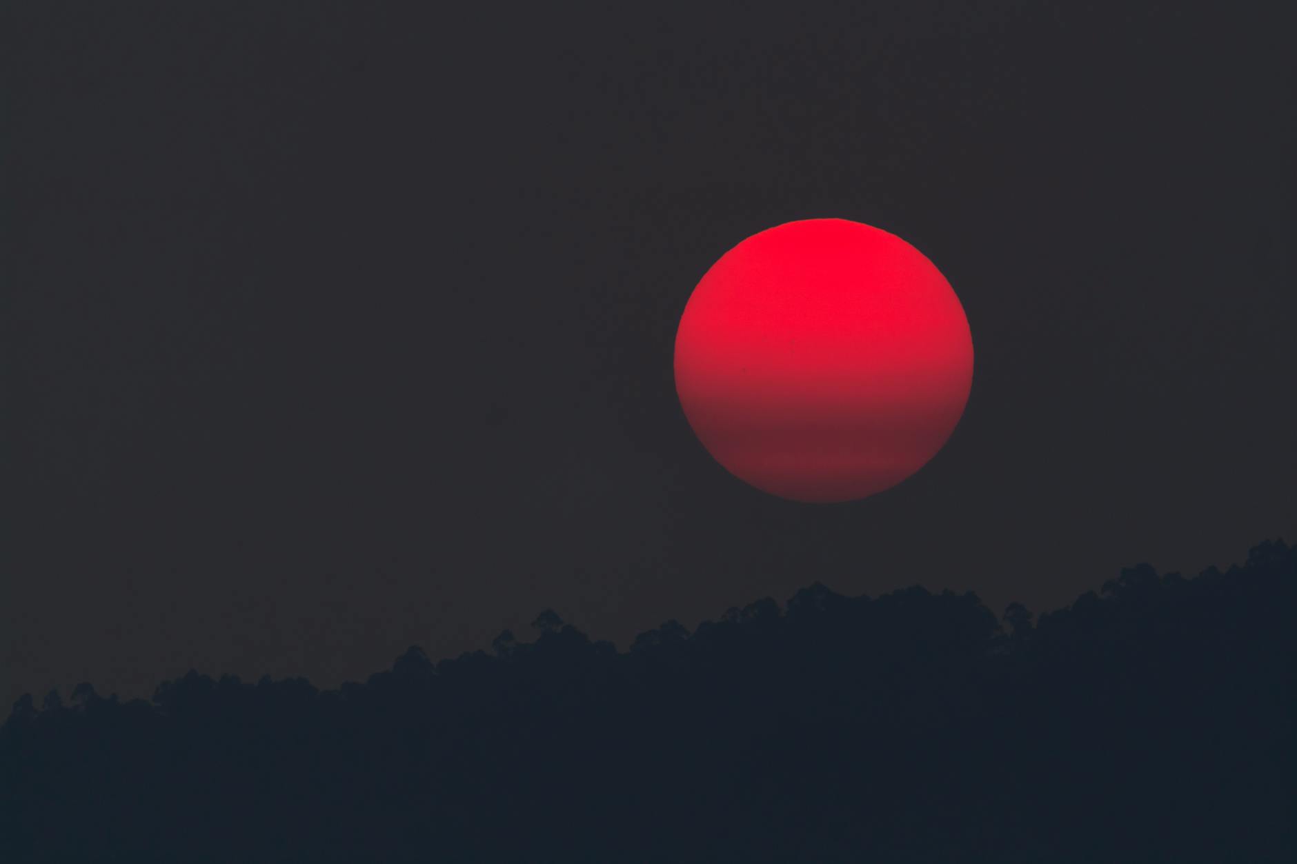 red moon during night time